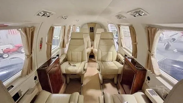 The interior cabin of the Piper Navajo CR with leather seats.