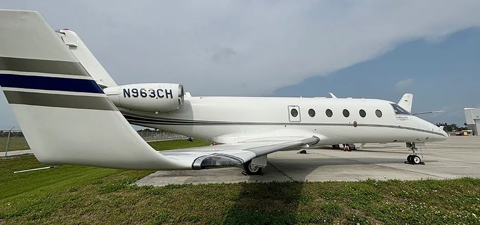 Side view of a Gulfstream G150 at the airport.