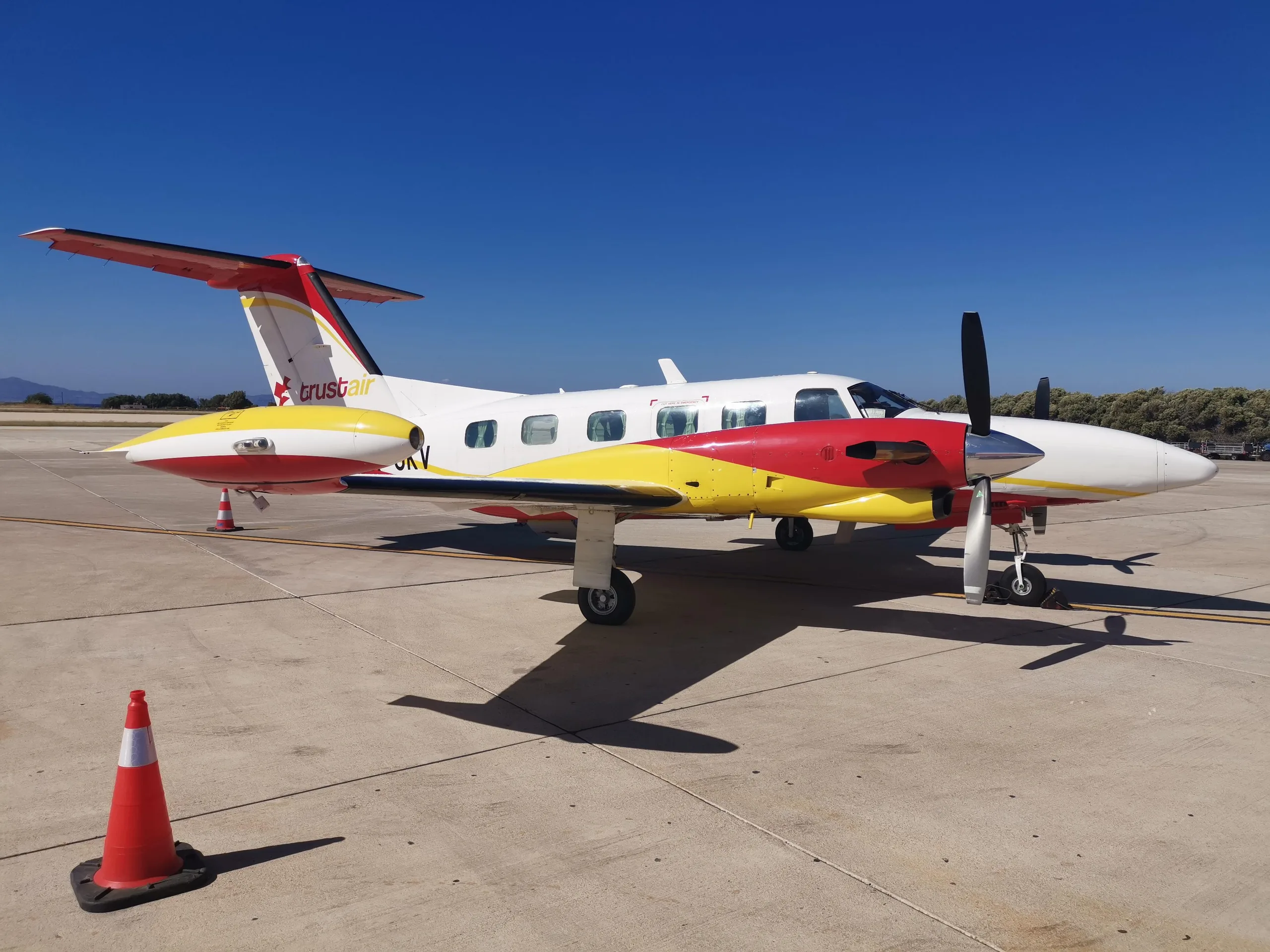 OK-OKV Cheyenne III aircraft with Trust Air livery parked on the tarmac.