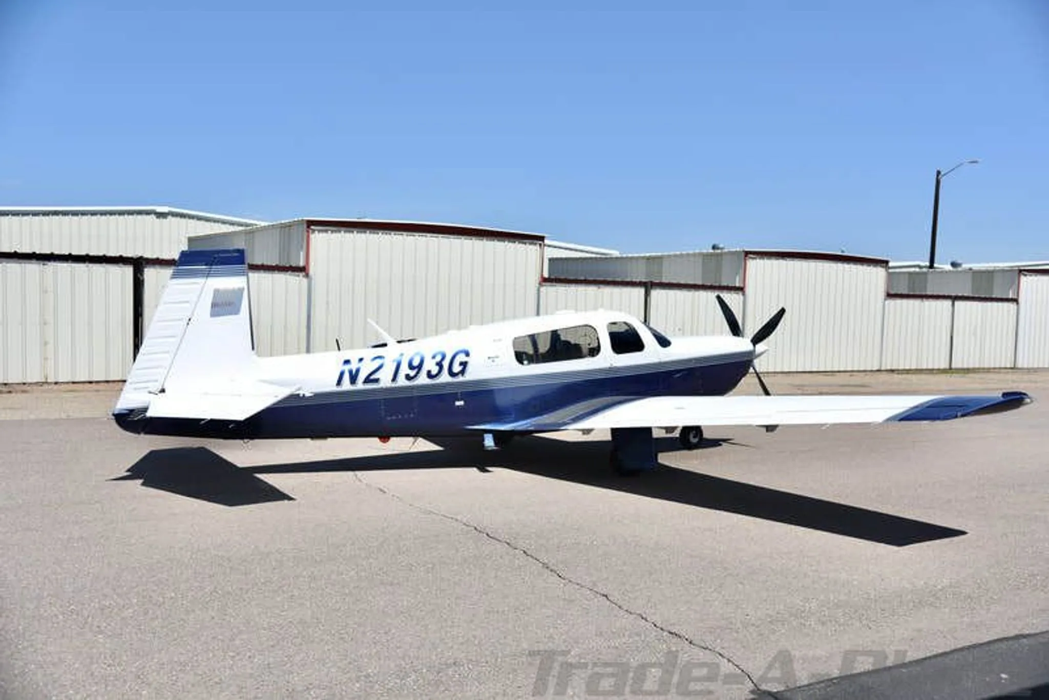 A side view of the aircraft on the ground.