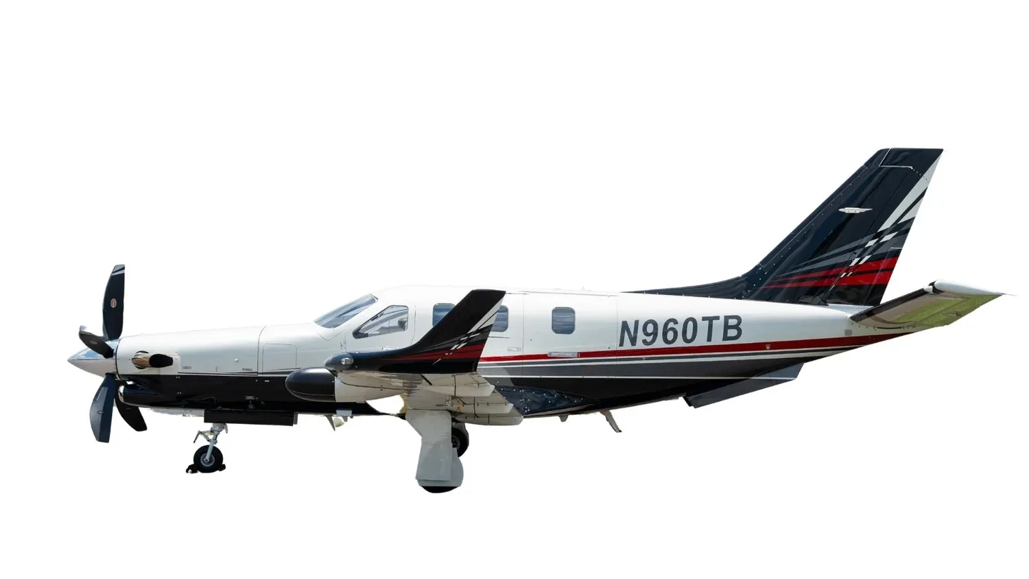A white and black TBM 960 aircraft with red accents, registration N960TB, shown in a side profile against a white background.