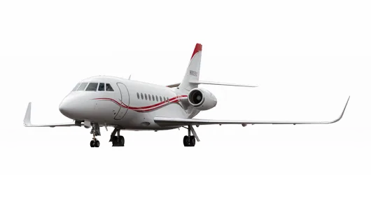 A white Dassault Falcon 900EX business jet with red accent stripes and a red tail, seen from the front-side on a white background.