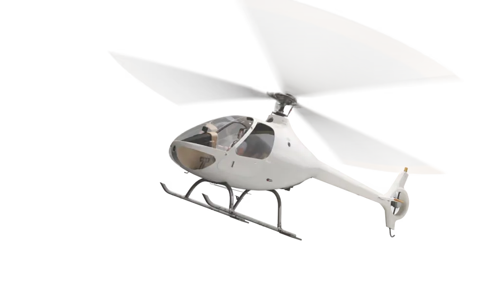 A white helicopter with orange-tipped rotor blades is shown from a low angle, appearing to be in flight against a plain background.