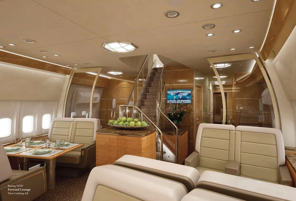 A rendering of a multi-level forward lounge in a Boeing 747SP, showing a staircase, dining table, and lounge seating.