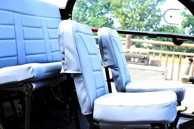 The interior seating of a 1959 Aerospatiale SE313B ALOUETTE-II helicopter.