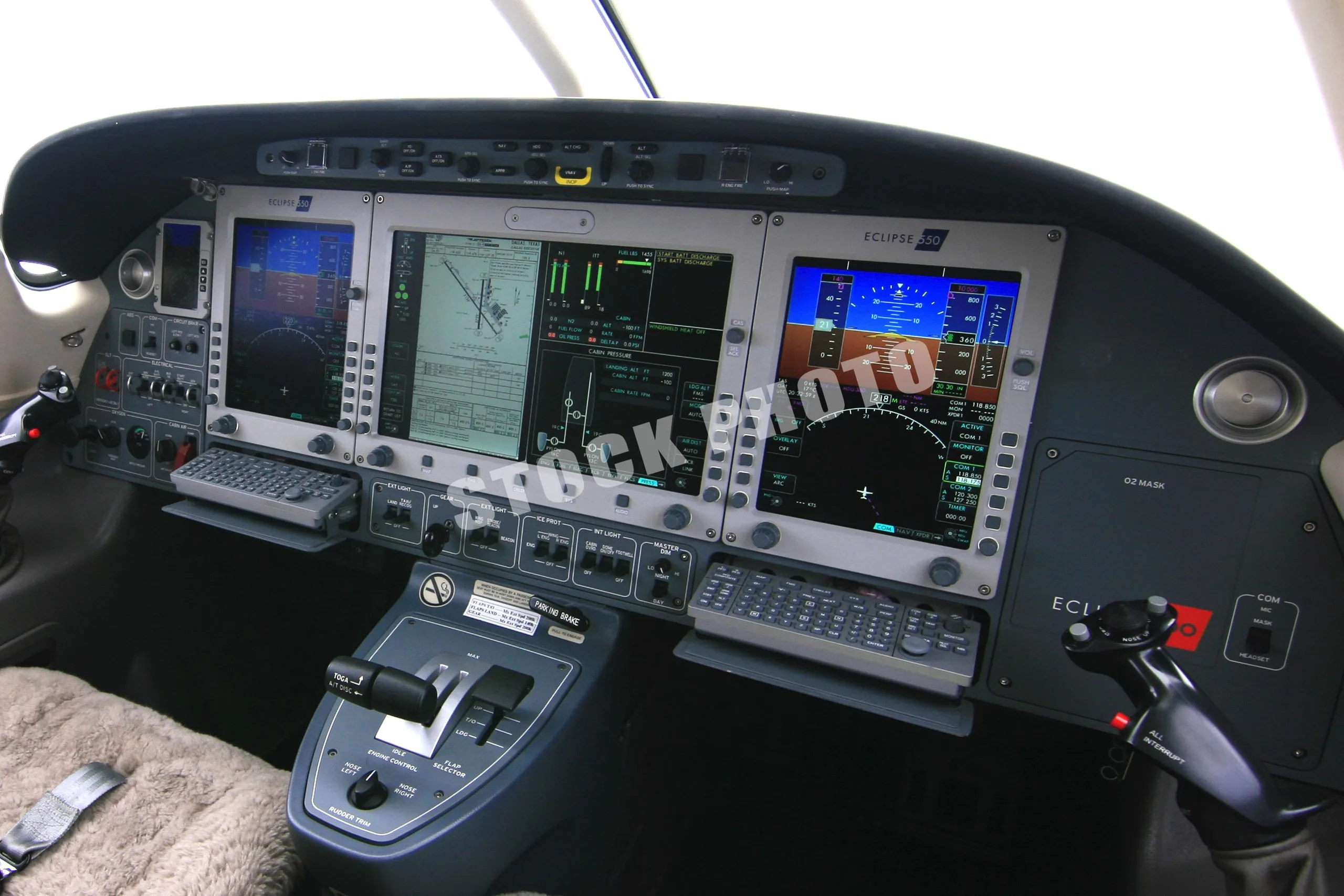 A close-up view of the pilot's side of the Eclipse 500 cockpit, showing the instrument panel and controls.