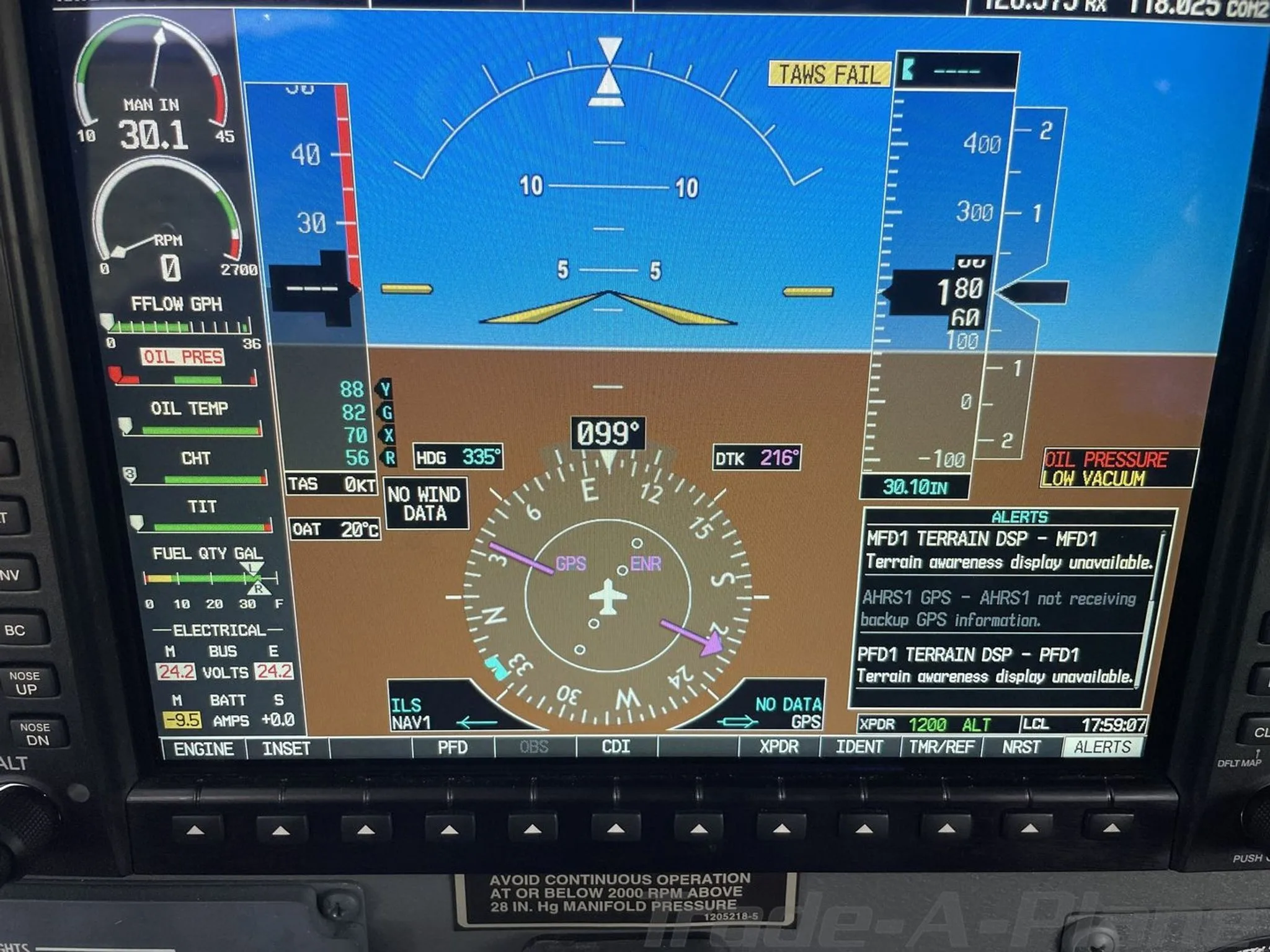 A close-up view of a modern glass cockpit display showing flight instruments and engine parameters.