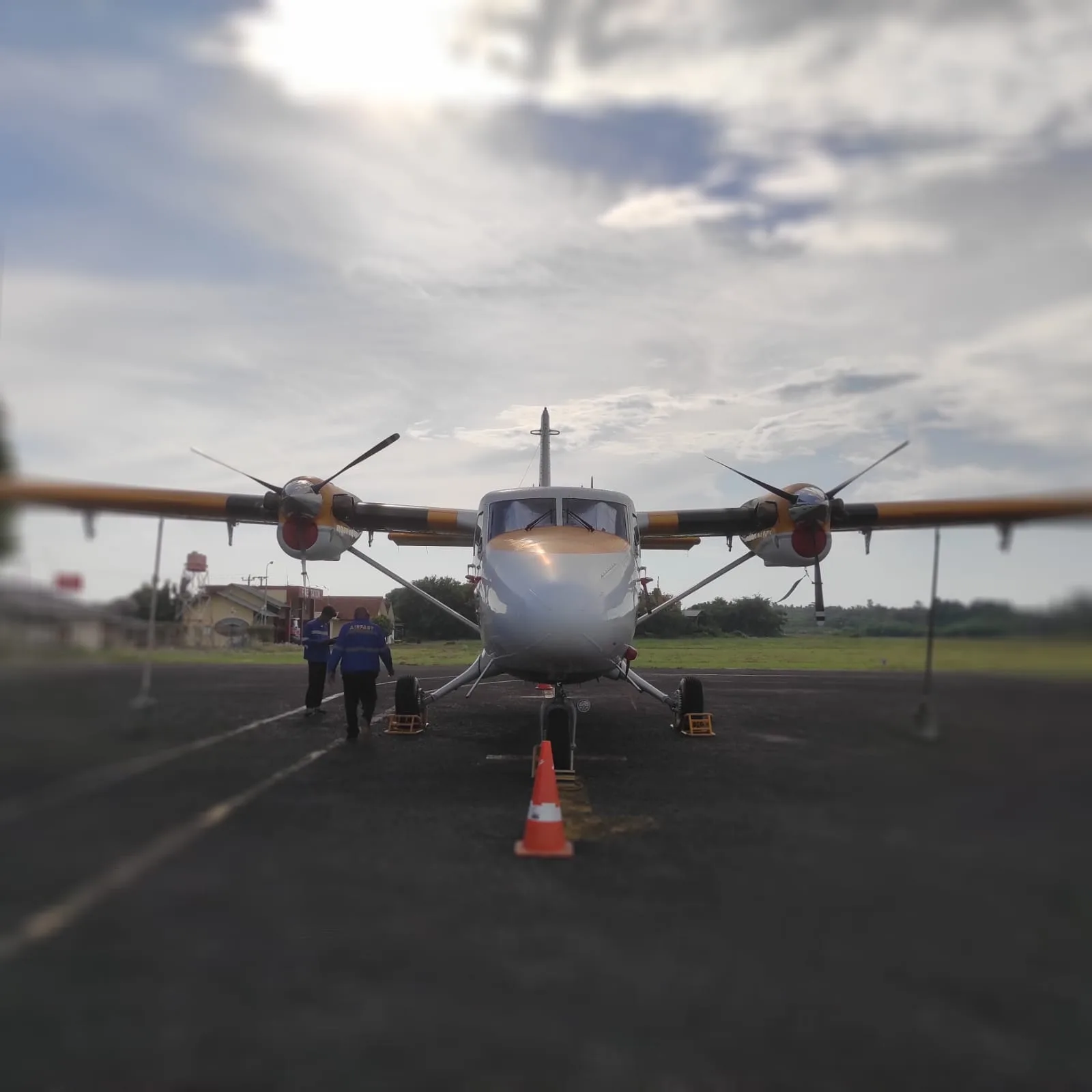 Front view of the PK-OCI Twin Otter Series 400 aircraft on the ground.