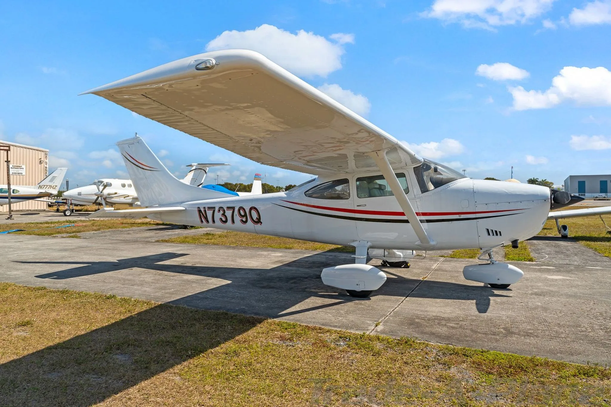 A side view of the Cessna 182P Skylane on the ground.