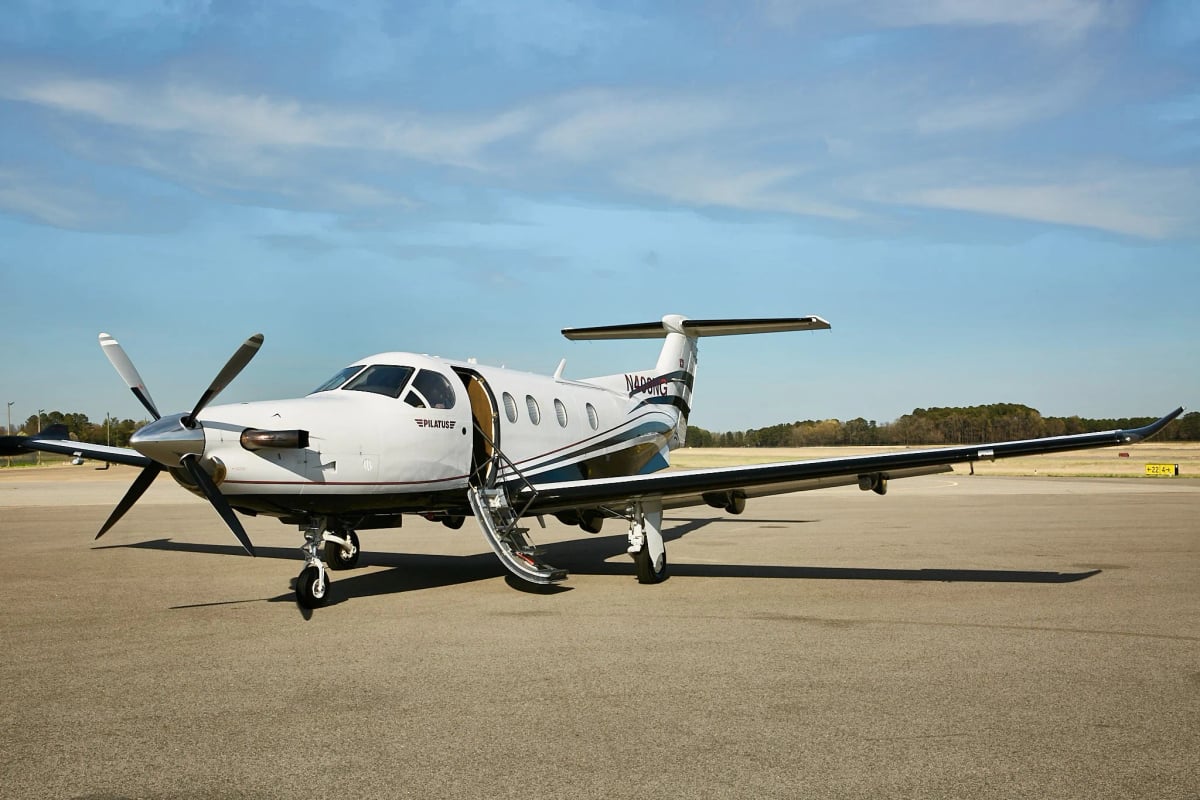 Pilatus PC-12NG on the tarmac with the entry stairs down.