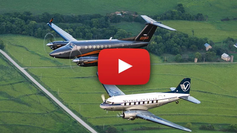 Beechcraft King Air N28BD and Douglas DC-3 in flight, with a play button overlay.