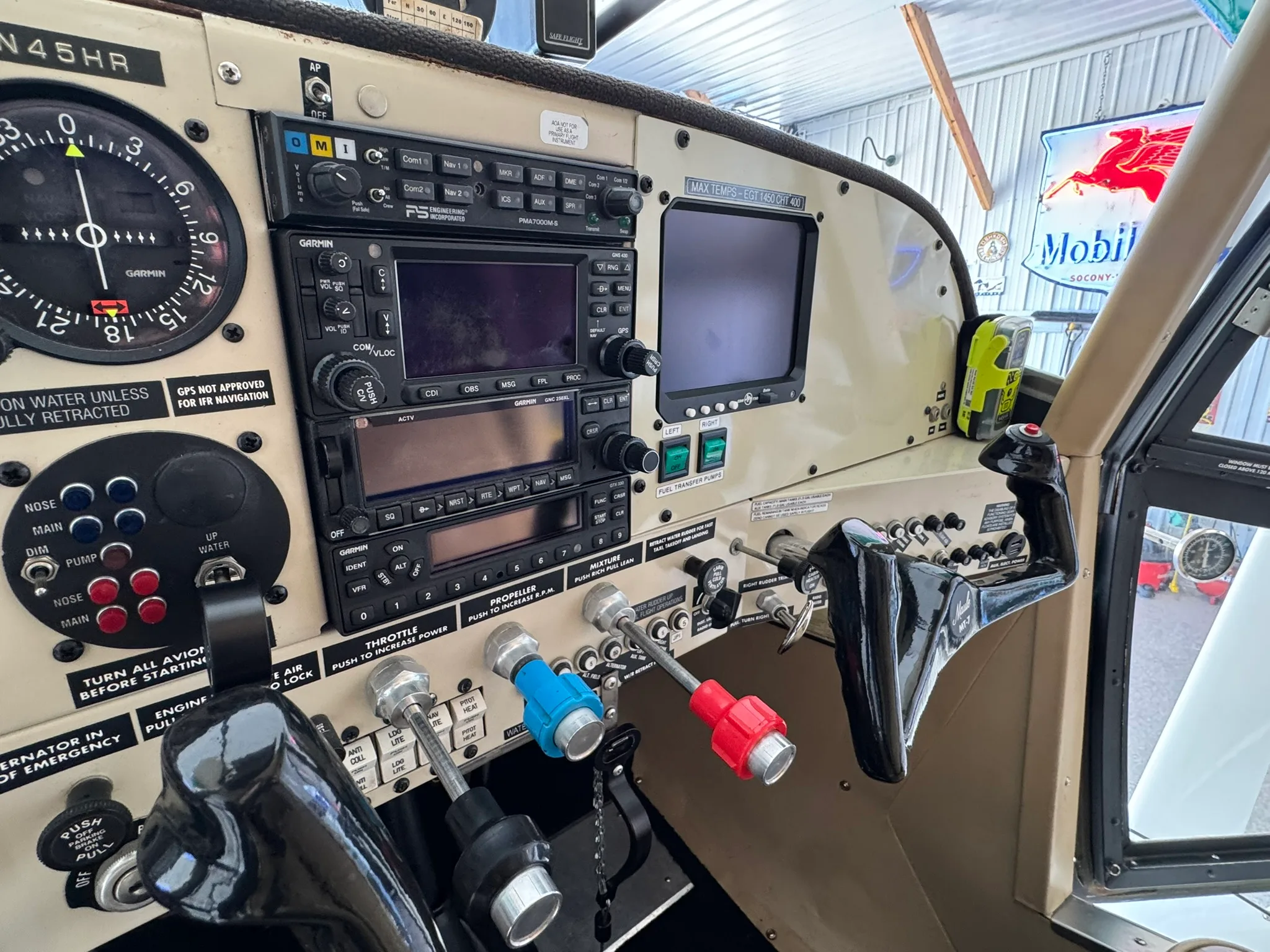Close-up of the aircraft's instrument panel with avionics and controls.