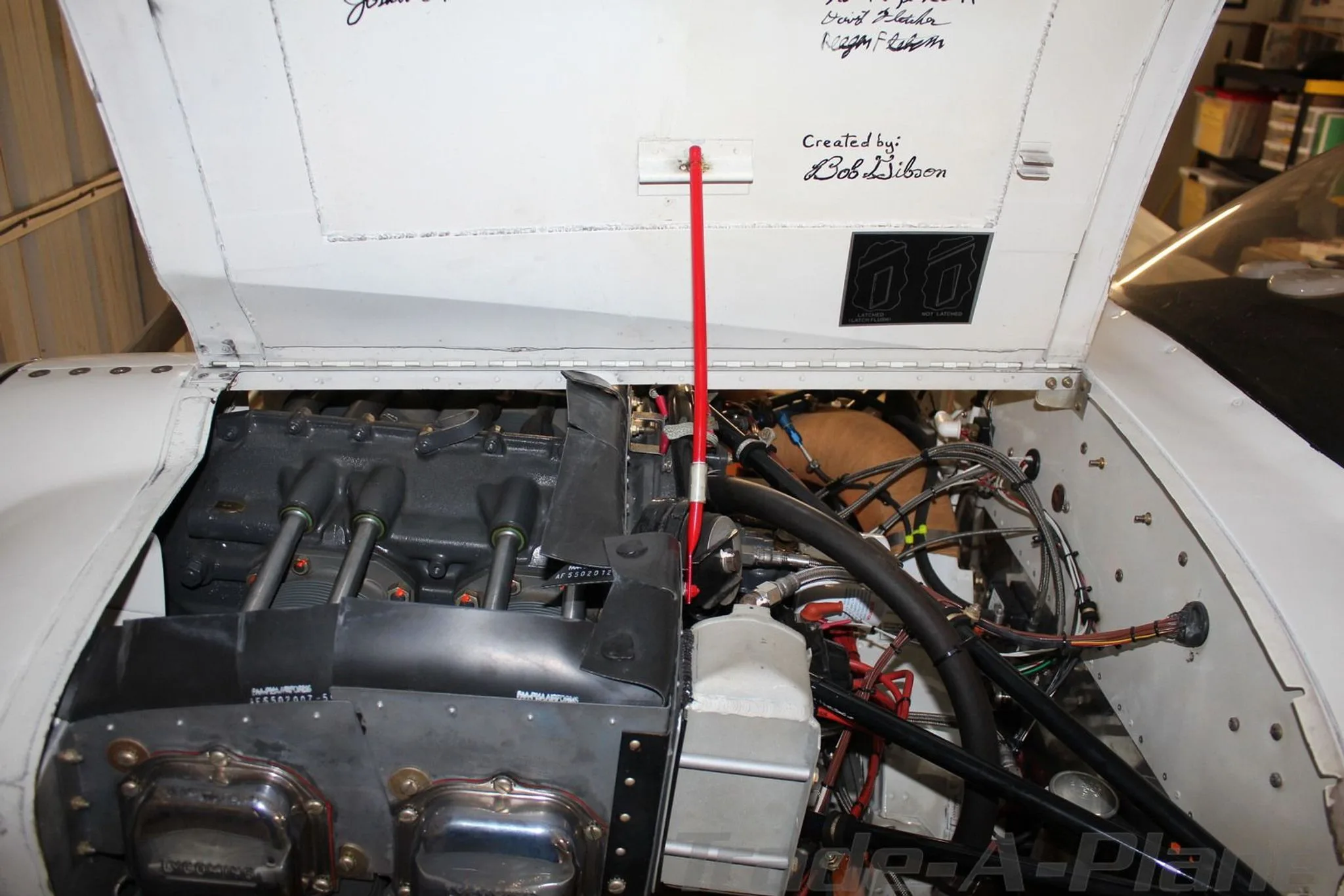 Another detailed view of the N5826L aircraft's engine compartment, revealing the engine block and associated systems.