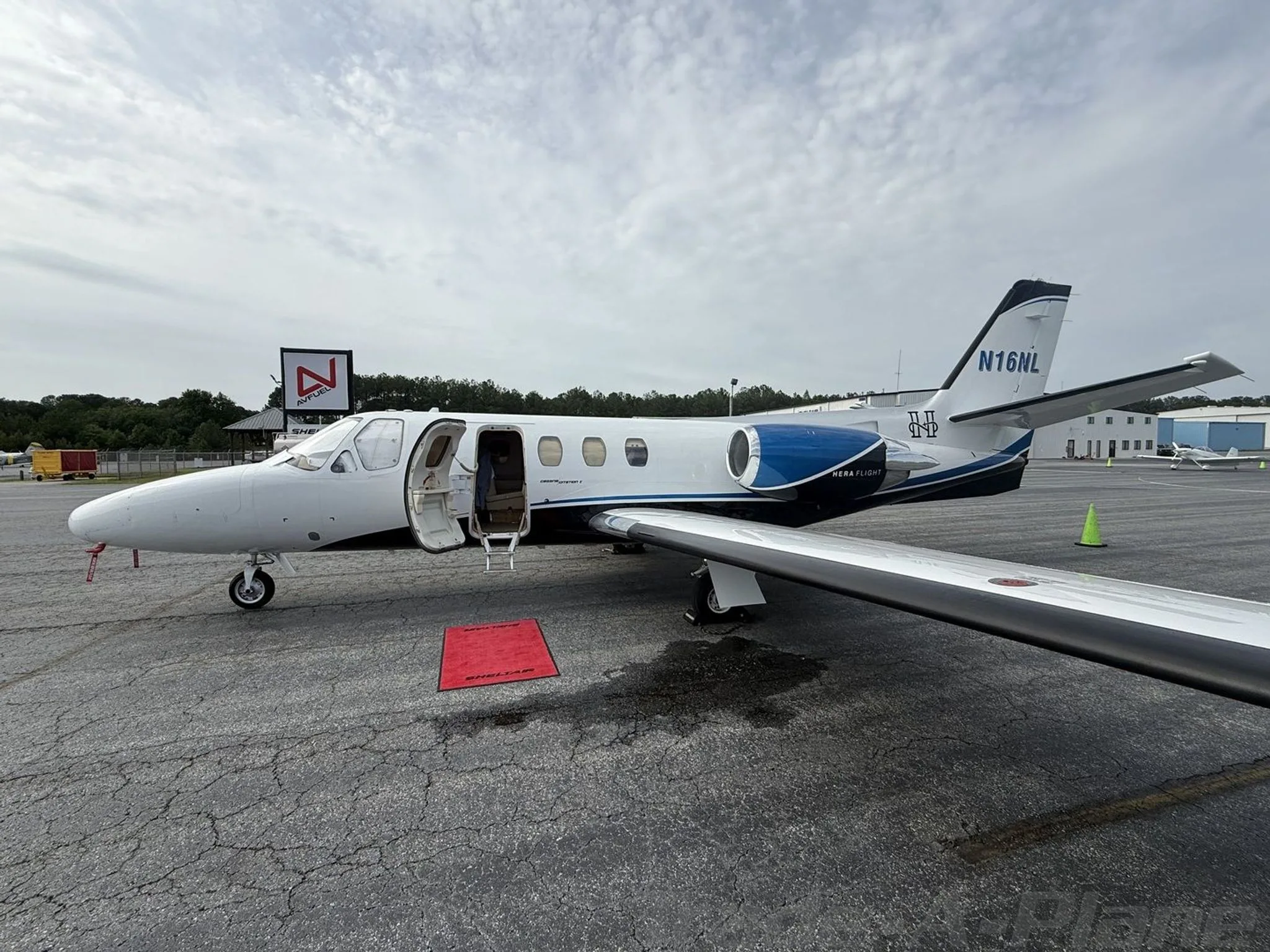 Another angle of the Cessna Citation ISP with the door open.