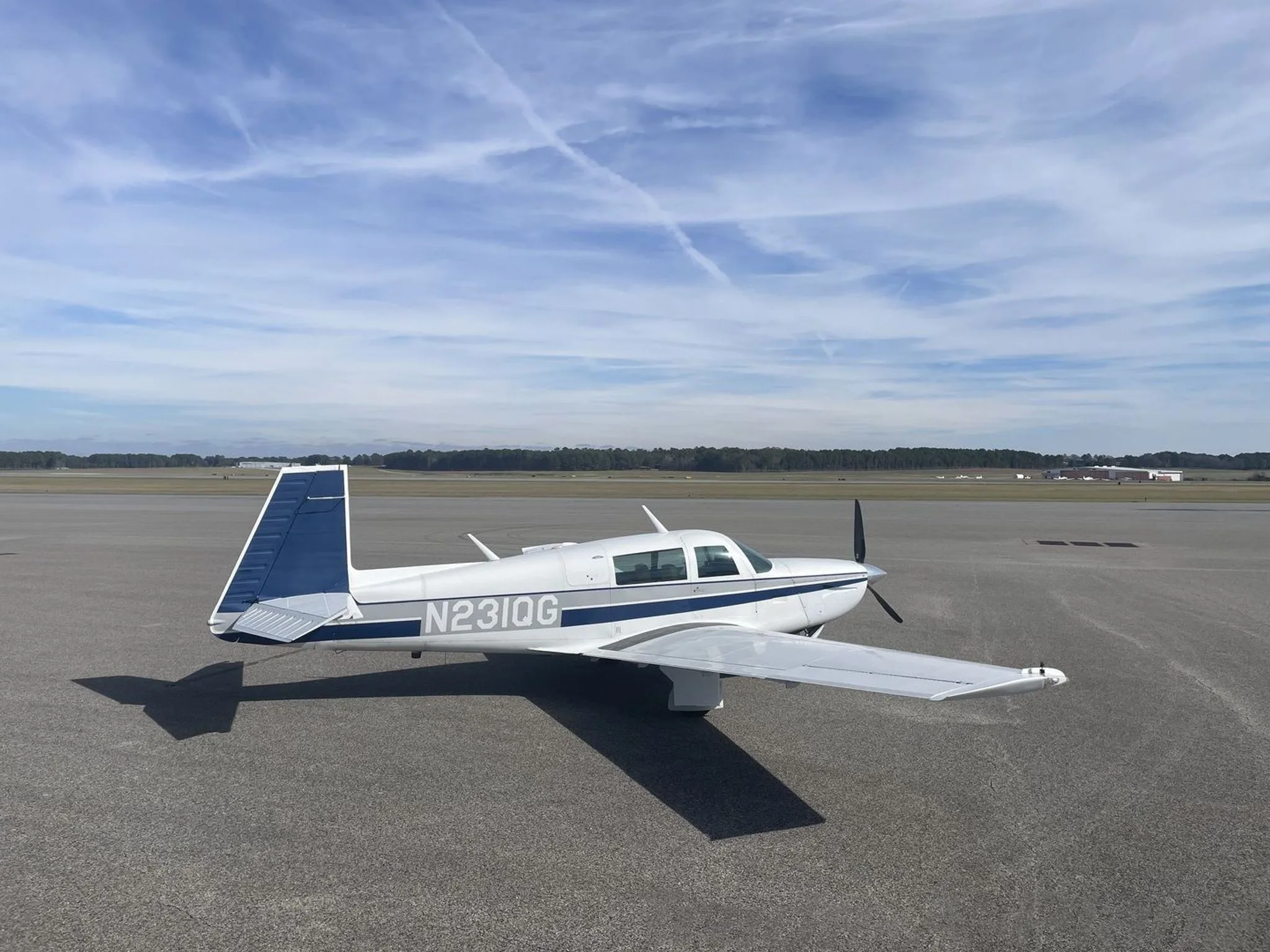 Another side view of the aircraft with a clear sky.