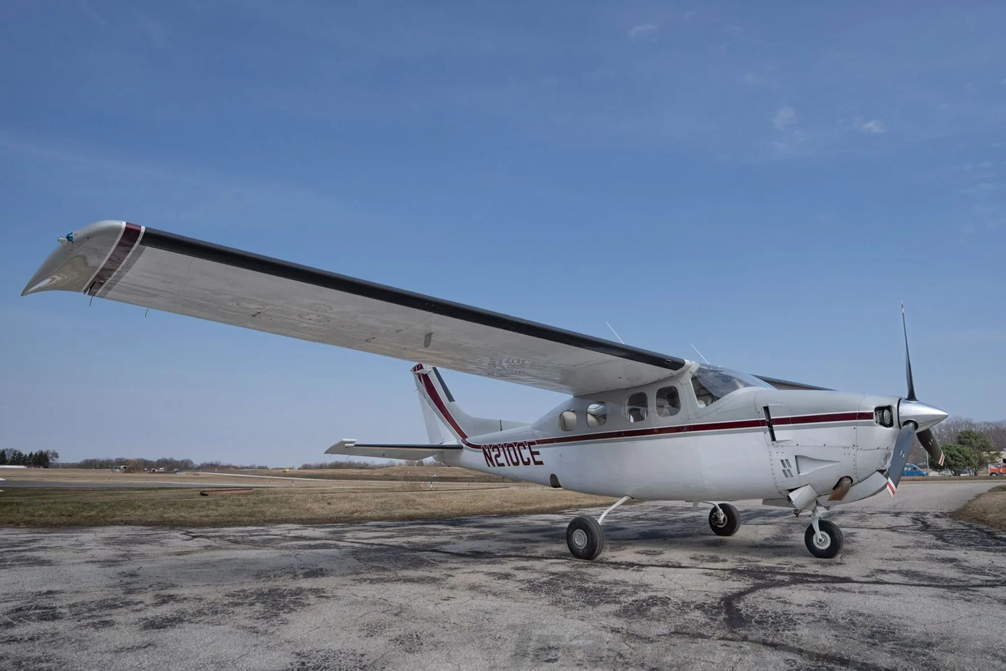 A side view of the Cessna P210N on the ground.