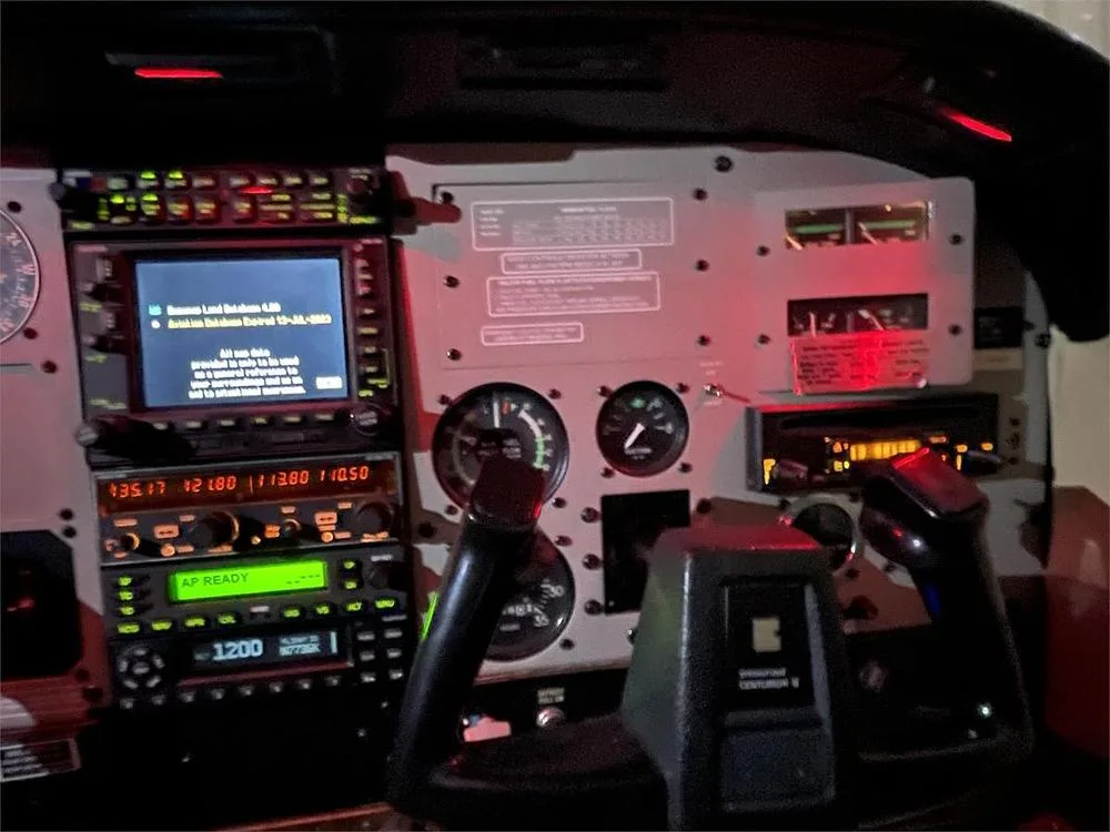 A close-up of the right side of the cockpit instrument panel, showing avionics and controls.