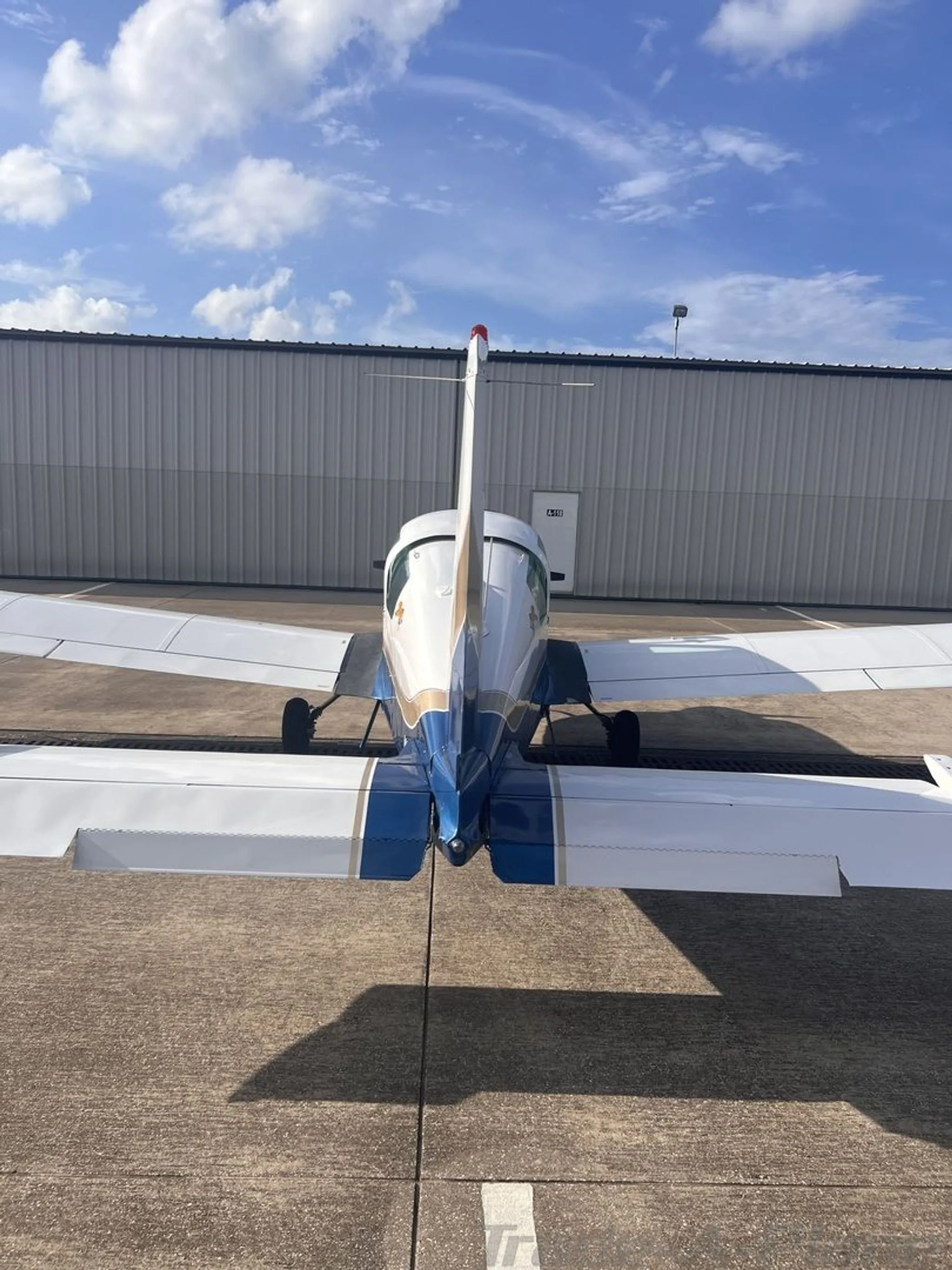 A frontal view of the aircraft on the ground.