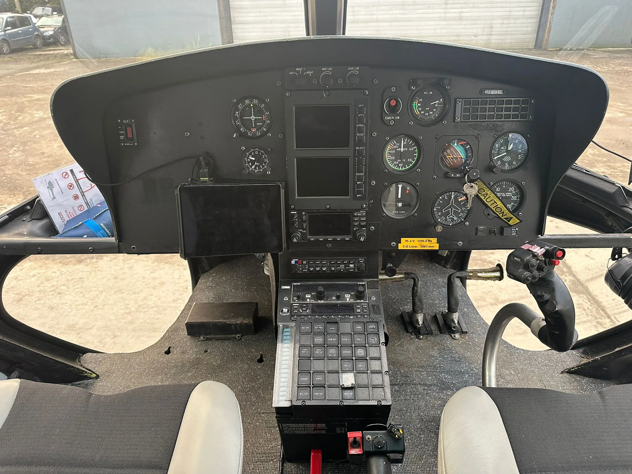View of the helicopter's instrument panel and controls.