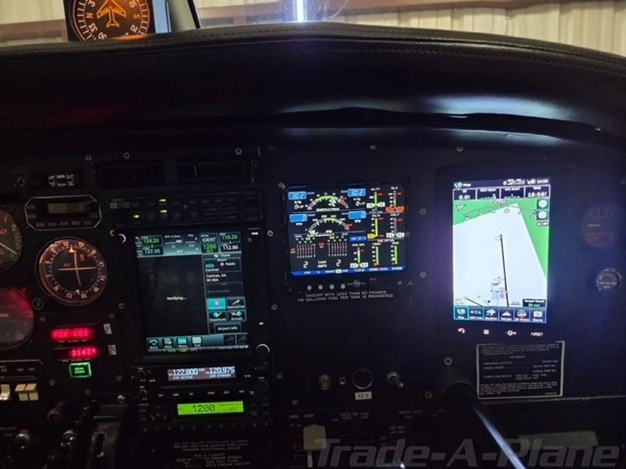 A close-up view of the digital displays and avionics in the cockpit of a Cessna 337 Skymaster.