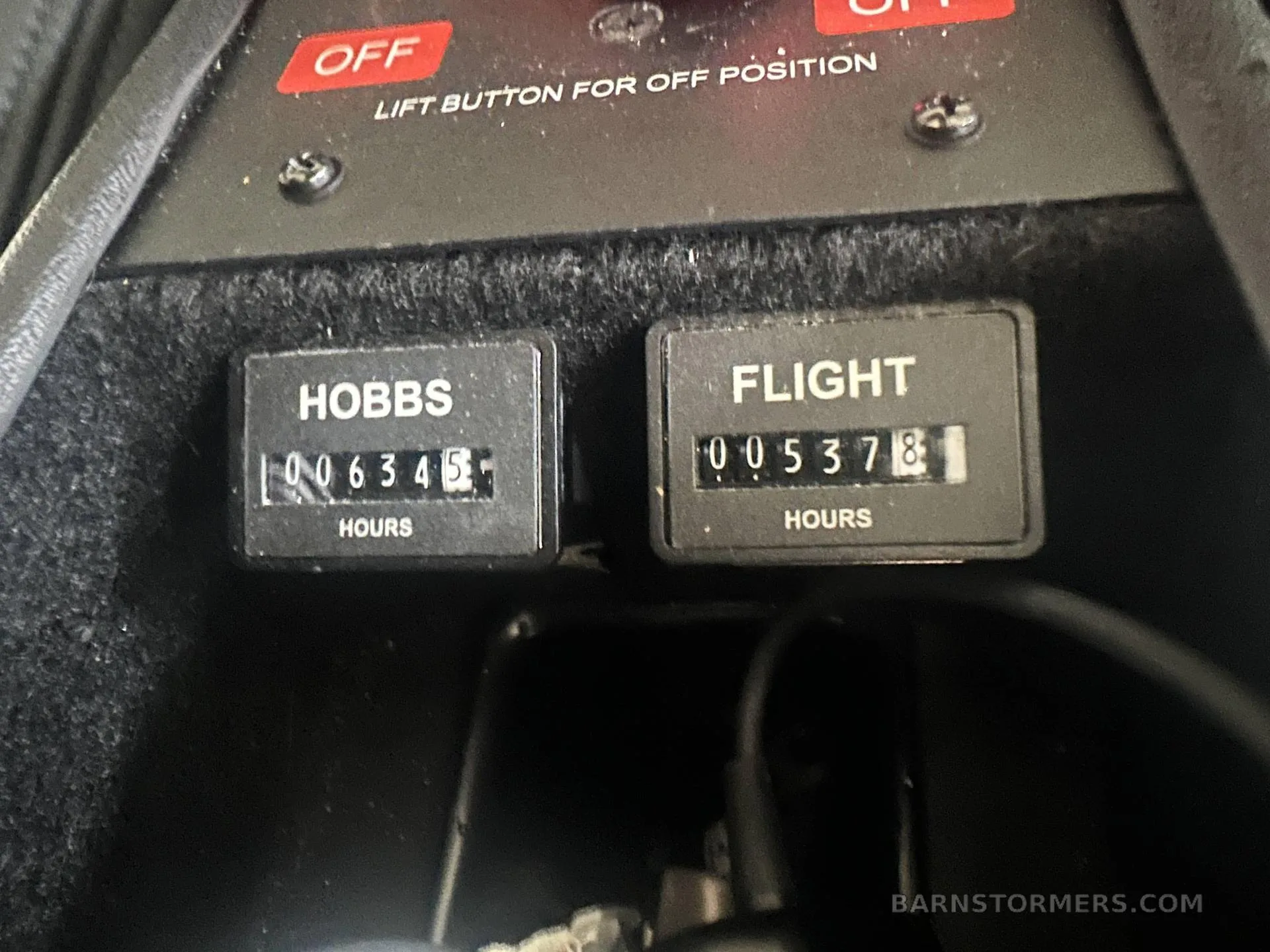 Close-up of the Hobbs and Flight hour meters showing 006345 and 005378 hours respectively.
